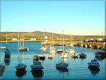 The low winter sun at Port St Mary Harbour.