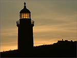 The Calf of Man Lighthouse at sunset - (24/6/03)