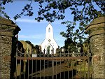 Looking through the old entrance gates to Braddan Cemetery.